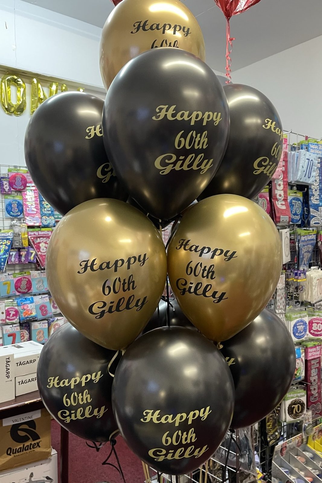 Set of thirteen printed birthday balloons